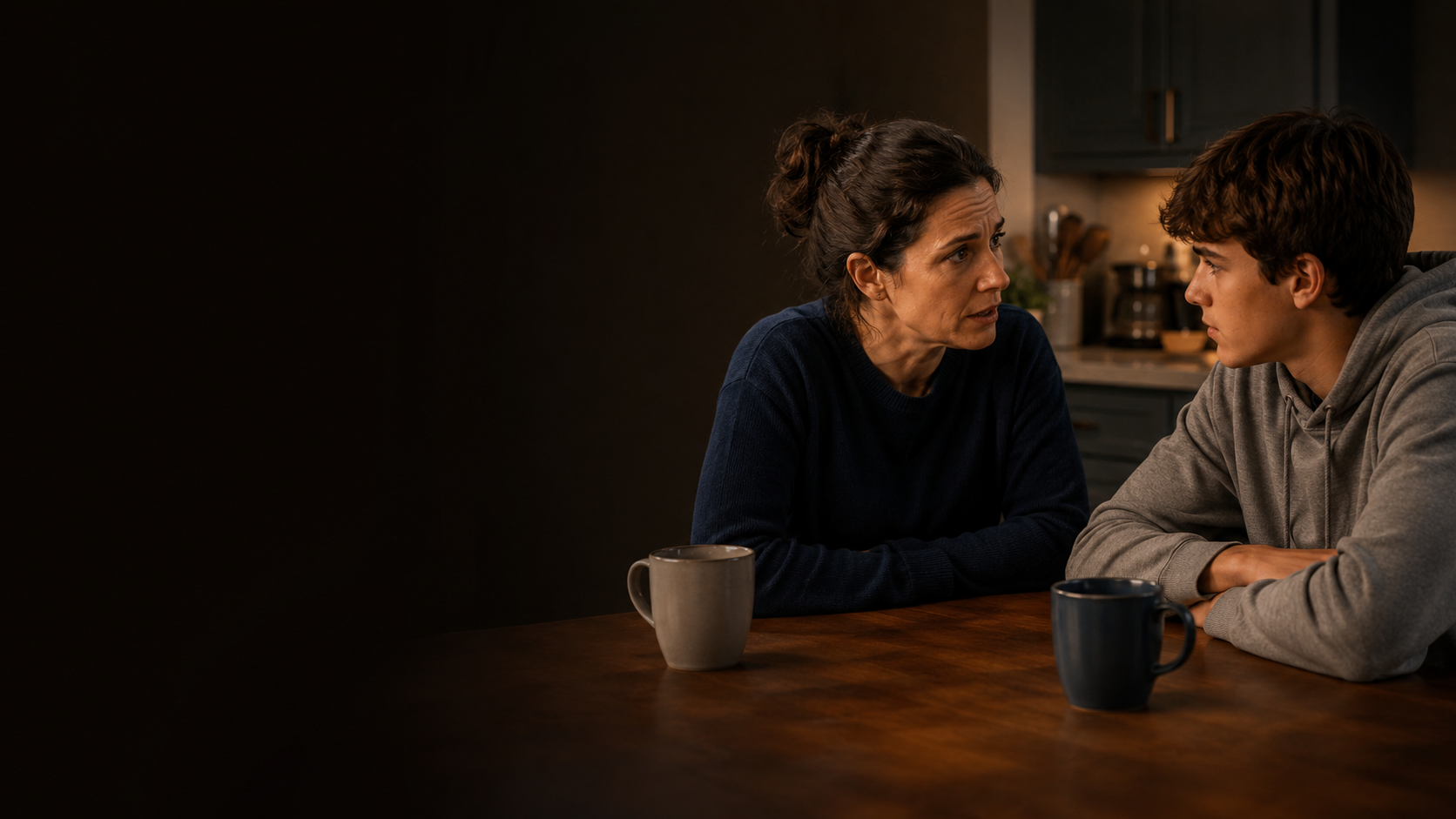 Parent and teen having a serious supportive conversation